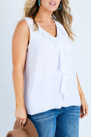 Model Jess wearing size 14 of the In Front Of Frills Top in colour White (White), from the front, cropped image