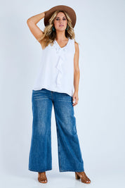 Model Jess wearing size 14 of the In Front Of Frills Top in colour White (White), from the front, showing the whole outfit