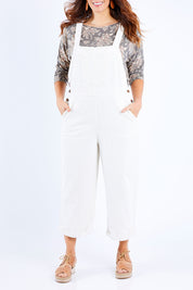 Model Laura wearing size 14 of the Ready For You Cord Overalls in colour Milk (White), from the front, cropped image