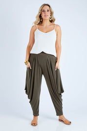 Model Jess wearing size 14 of The Wanderer In Me Travel Pant in colour Khaki (Green), from the front, showing the whole outfit