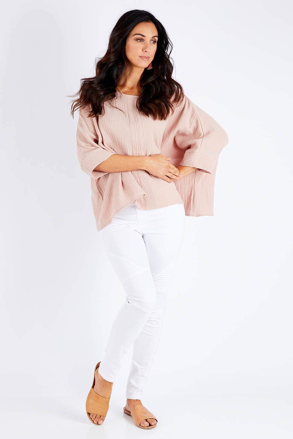 Model Chelsea wearing size 10 of the Flow With Me Cotton Slouch Top in colour Petal (Pink), from the front, showing the whole outfit
