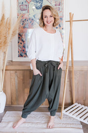 Model Steph wearing size 10 of the Flow With Me Cotton Slouch Top in colour White (White), from the front, showing the whole outfit