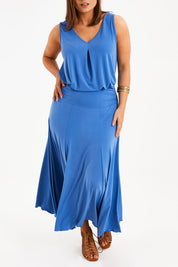 Model Monique wearing size 14 of The Wanderer In Me Travel Skirt in colour Denim (Blue), from the front, cropped image
