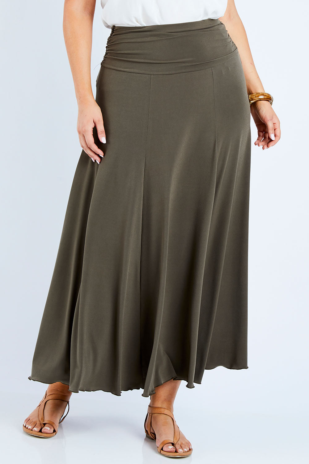 Model Jess wearing size 14 of The Wanderer In Me Travel Skirt in colour Khaki (Green), from the front, cropped image