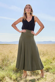 Model Tegan wearing size 10 of The Wanderer In Me Travel Skirt in colour Khaki (Green), from the front, showing the whole outfit