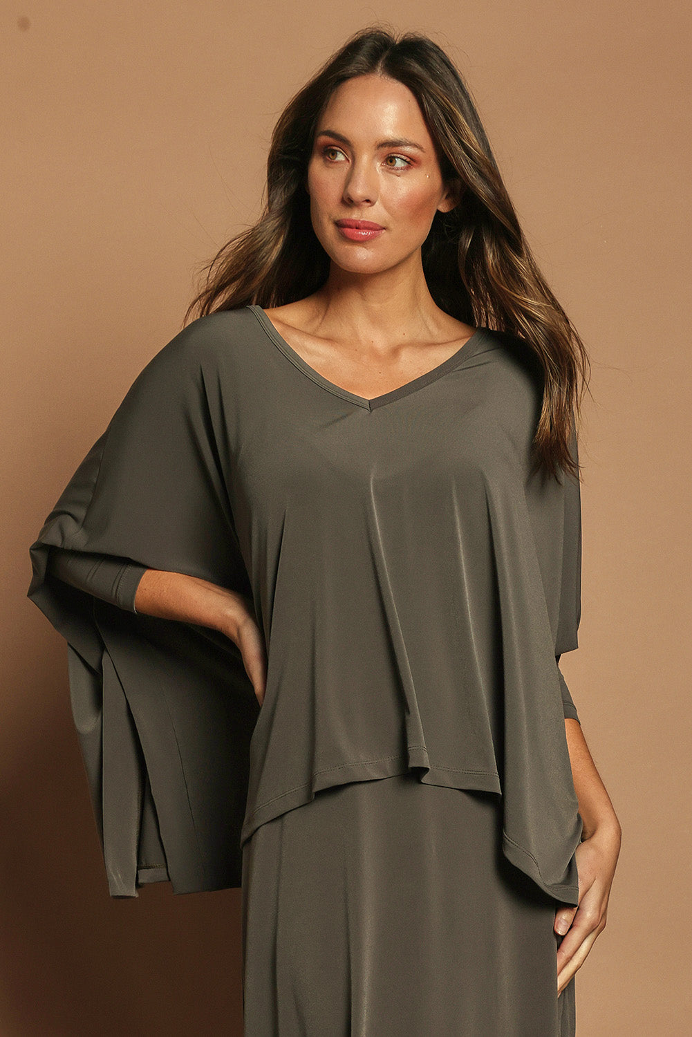 Model Madeline wearing size 10 of The Wanderer In Me Travel Set in colour Khaki (Green), from the front, cropped image