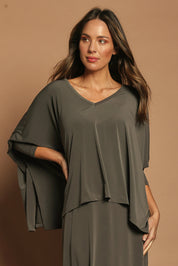 Model Madeline wearing size 10 of The Wanderer In Me Travel Set in colour Khaki (Green), from the front, cropped image