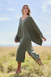 Model Tegan wearing size 10 of The Wanderer In Me Travel Set in colour Khaki (Green), from the front, showing the whole outfit