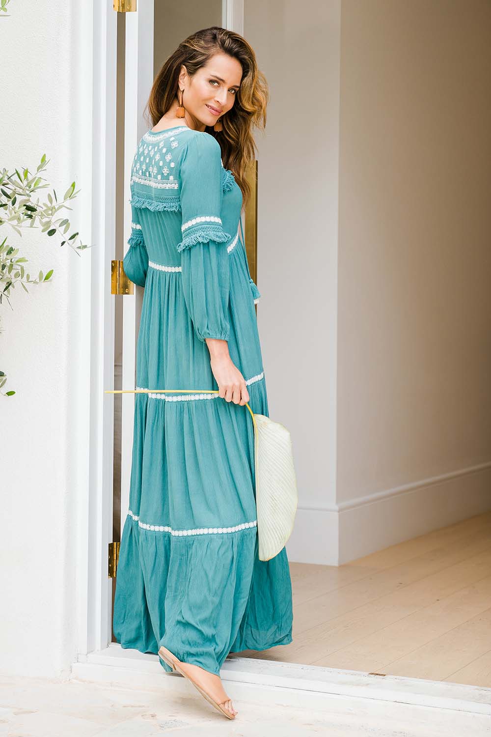 Model Ilona wearing size 10 of The Layers Of Love Maxi Dress in colour Moss (Green), from the front, showing the whole outfit