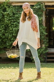Model Ilona wearing size S of the Nothing Better Than You Cotton Sweater in colour Milk (White), from the front, showing the whole outfit