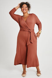 Model Alexis wearing size 16 of the Stylish Comfort Bamboo Jumpsuit in colour Copper, from the front, showing the whole outfit