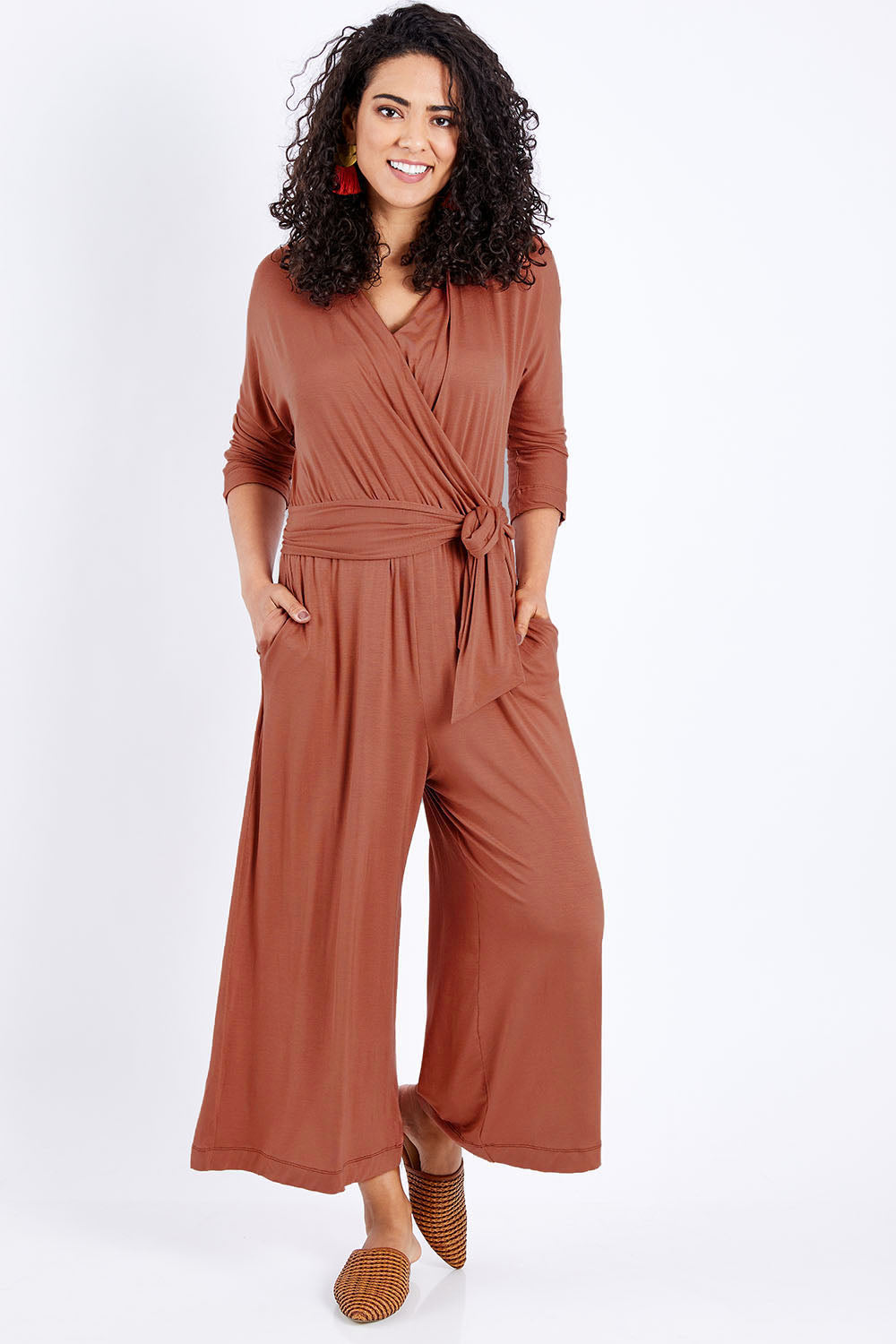 Model Pamela wearing size 10 of the Stylish Comfort Bamboo Jumpsuit in colour Copper, from the front, showing the whole outfit