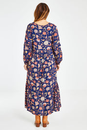Model Laura wearing size 14 of the Its Better With You Dress in colour Deepblue (Blue), from the back