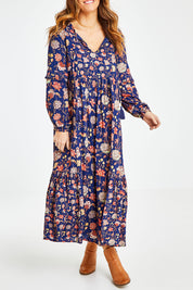 Model Laura wearing size 14 of the Its Better With You Dress in colour Deepblue (Blue), from the front, cropped image
