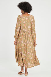 Model Aiyana wearing size 10 of the Its Better With You Dress in colour Khaki (Green), from the back