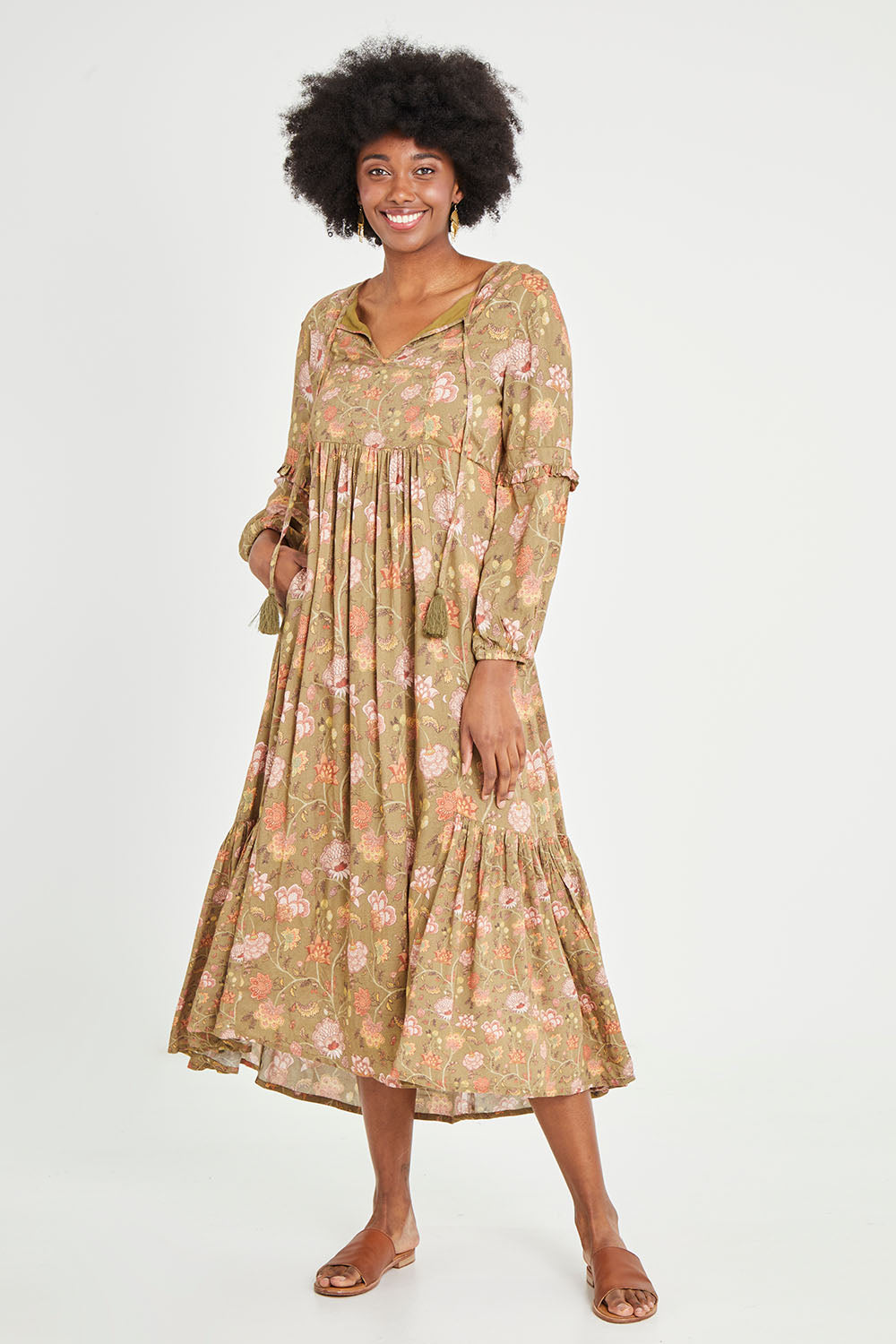 Model Aiyana wearing size 10 of the Its Better With You Dress in colour Khaki (Green), from the front, showing the whole outfit