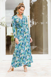 Model Ilona wearing size 10 of the Life Is Beautiful Wrap Maxi Dress in colour Bluefleur (Blue), from the front, showing the whole outfit