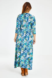 Model Laura wearing size 14 of the Life Is Beautiful Wrap Maxi Dress in colour Bluefleur (Blue), from the back