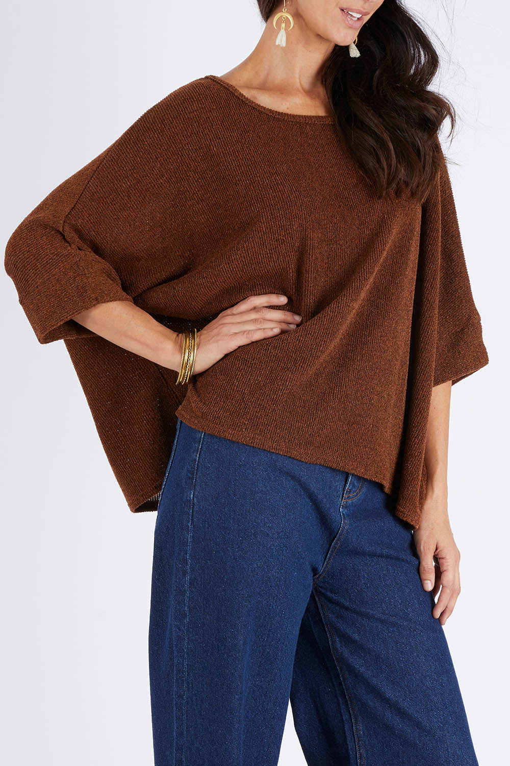 Model Gemma wearing size 10 of the Flow With Me Slouch Knit Top in colour Bark, from the front, cropped image