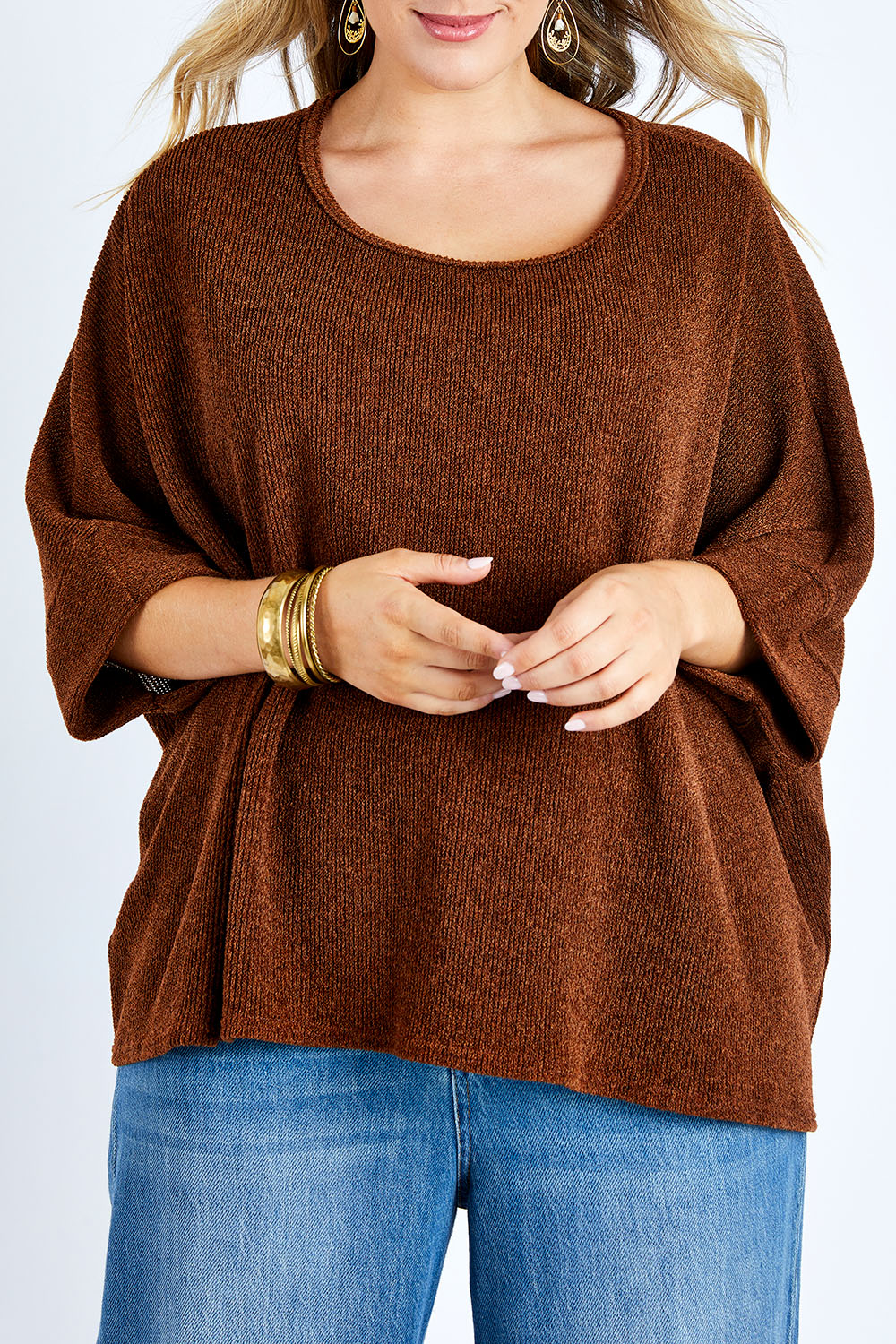 Model Jess wearing size 14 of the Flow With Me Slouch Knit Top in colour Bark, from the front, cropped image