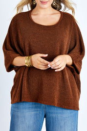 Model Jess wearing size 14 of the Flow With Me Slouch Knit Top in colour Bark, from the front, cropped image