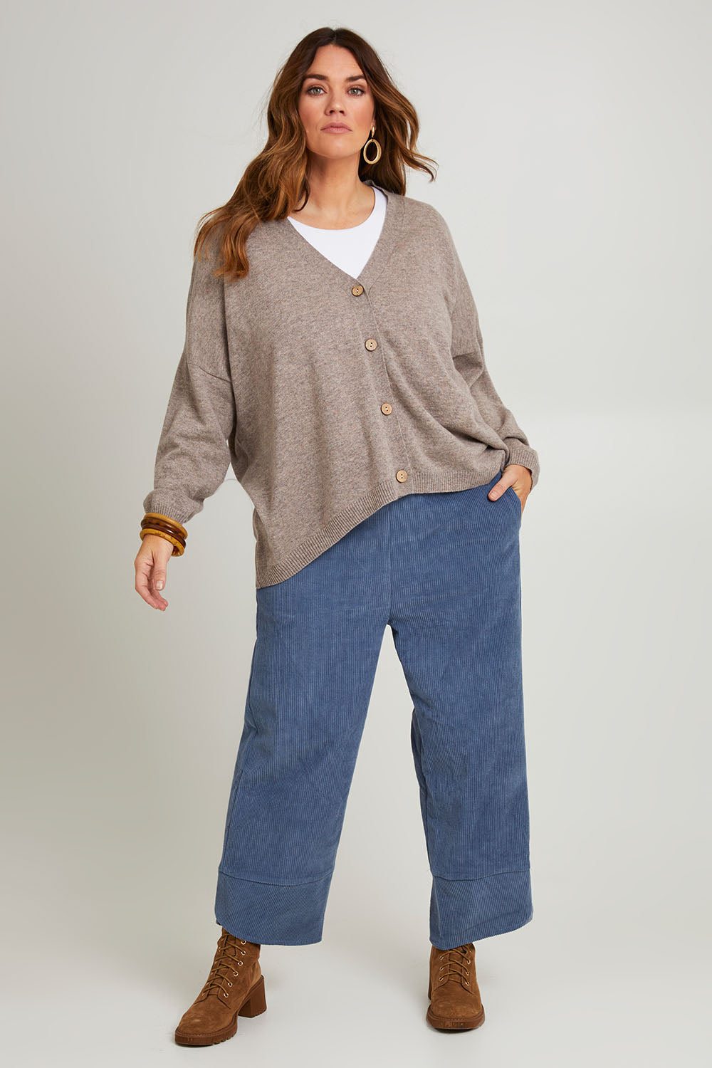 Model Laura wearing size 14 of the Ready For You Cord Pants in colour Blue (Blue), from the front, showing the whole outfit