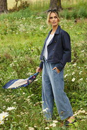 Model Tegan wearing size 10 of the Ready For You Cord Pants in colour Blue (Blue), from the front, showing the whole outfit