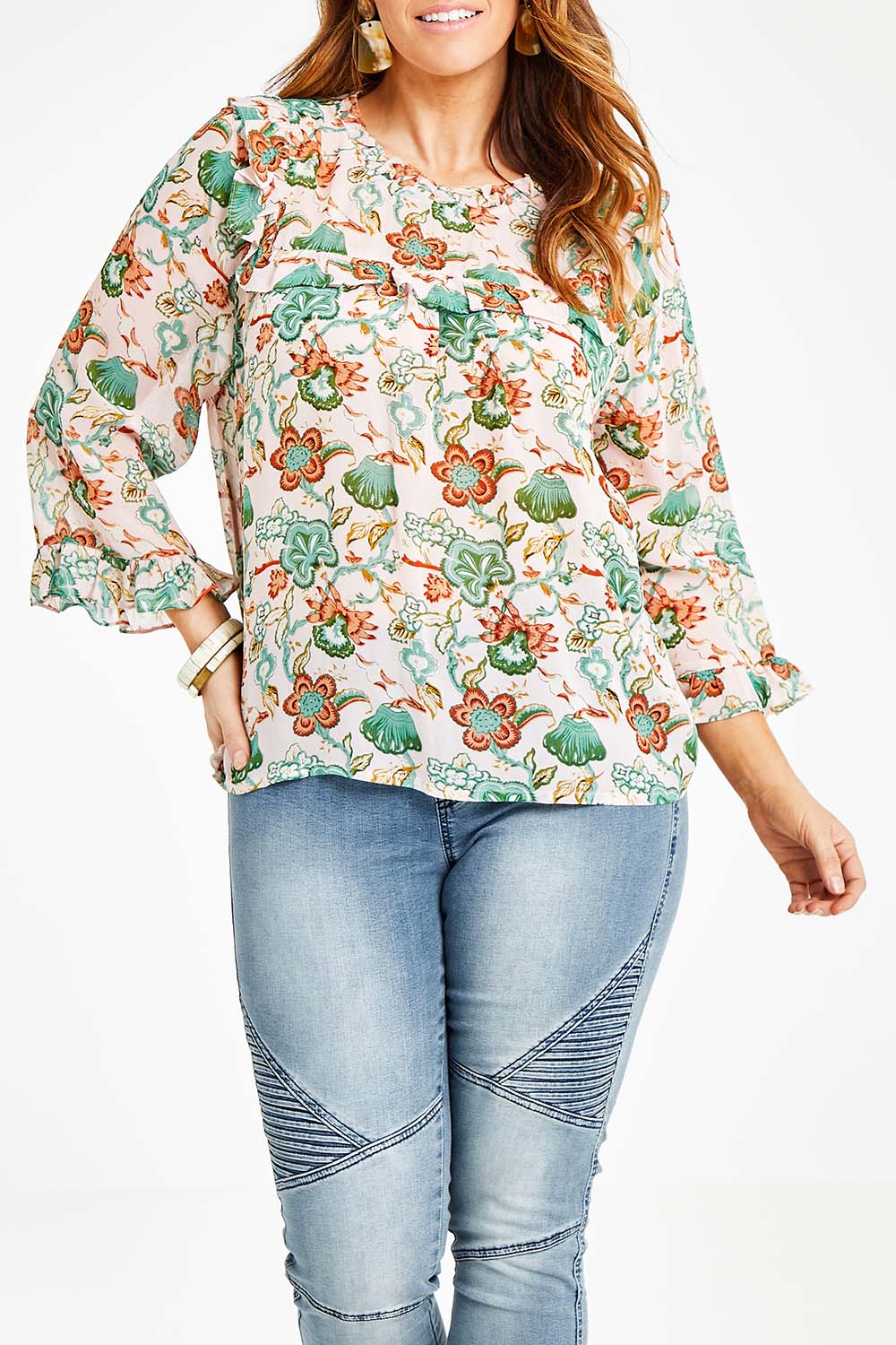 Model Laura wearing size 14 of the Meet Me At Midnight Blouse in colour Pastel (Pink), from the front, cropped image