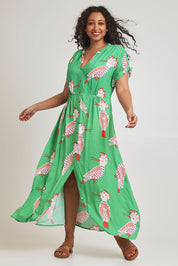 Model Terri-Leigh wearing size 14 of the Wild Garden Maxi Dress in colour Emerald (Green), from the front, showing the whole outfit