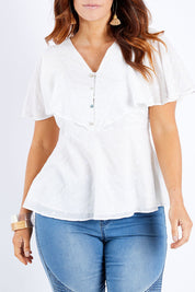 Model Laura wearing size 14 of the Wild Heart Embroidered Blouse in colour Milk (White), from the front, cropped image