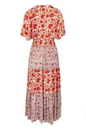 Product shot of the Tiers Of Joy Maxi Dress in colour Coralfleur, from the back