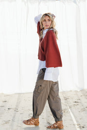 Model Tegan wearing size 10 of the Travel With You Cargo Pants in colour Castle, from the front, showing the whole outfit
