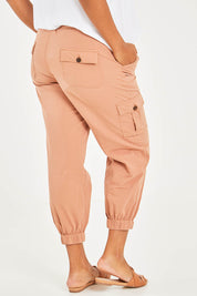 Model Noli wearing size 14 of the Travel With You Cargo Pants in colour Dust, from the back