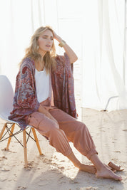 Model Tegan wearing size 10 of the Travel With You Cargo Pants in colour Dust, from the front, showing the whole outfit
