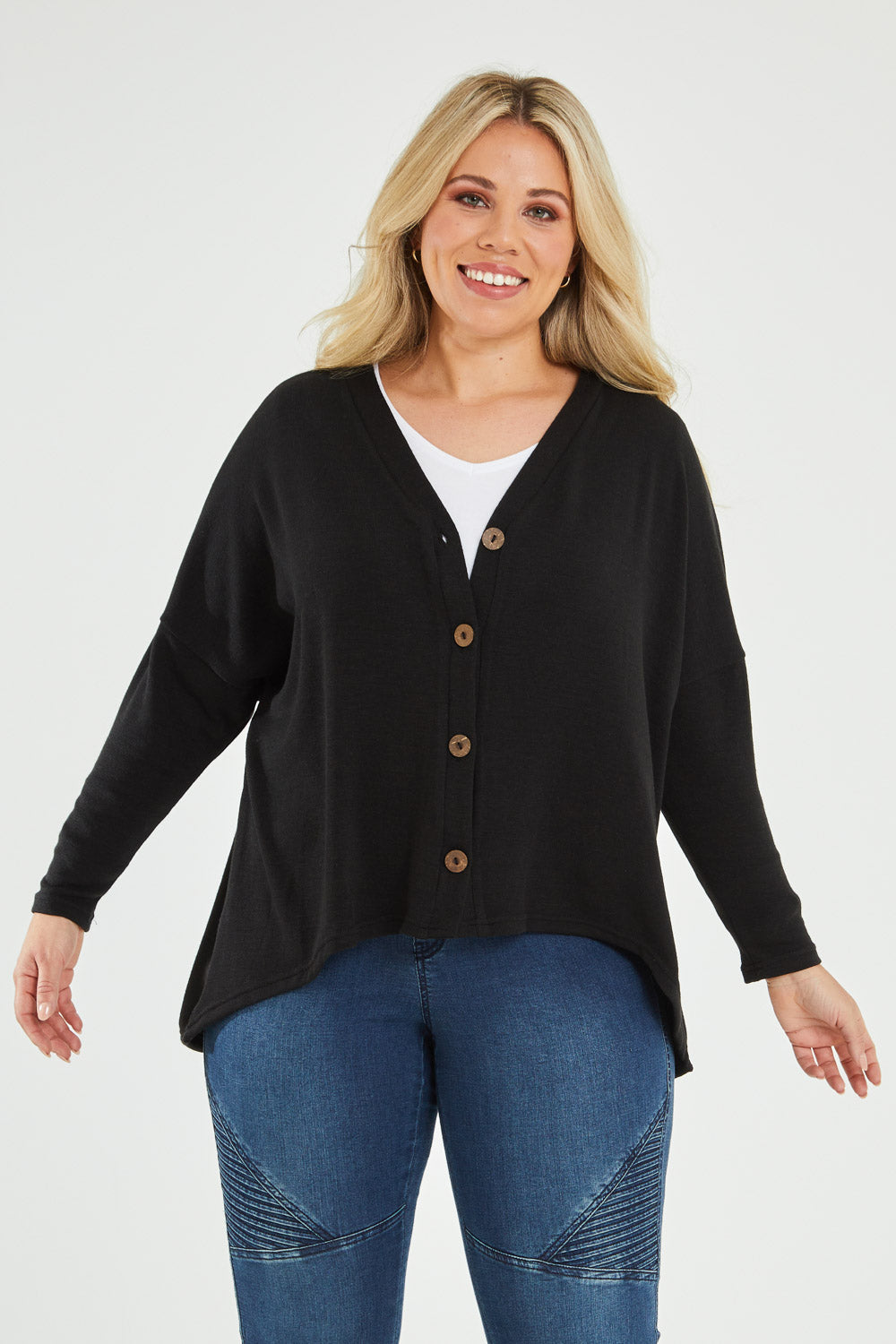 Model Katie wearing size 16 of the My Boyfriends Slouch Cardi in colour Black (Black), from the front, cropped image