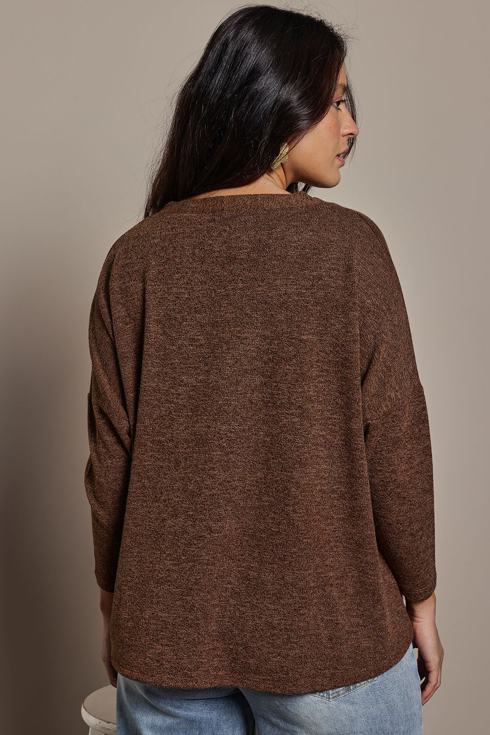 Model Tahnee wearing size 10 of the My Boyfriends Slouch Cardi in colour Chocolate, from the back