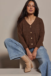 Model Tahnee wearing size 10 of the My Boyfriends Slouch Cardi in colour Chocolate, from the front, cropped image