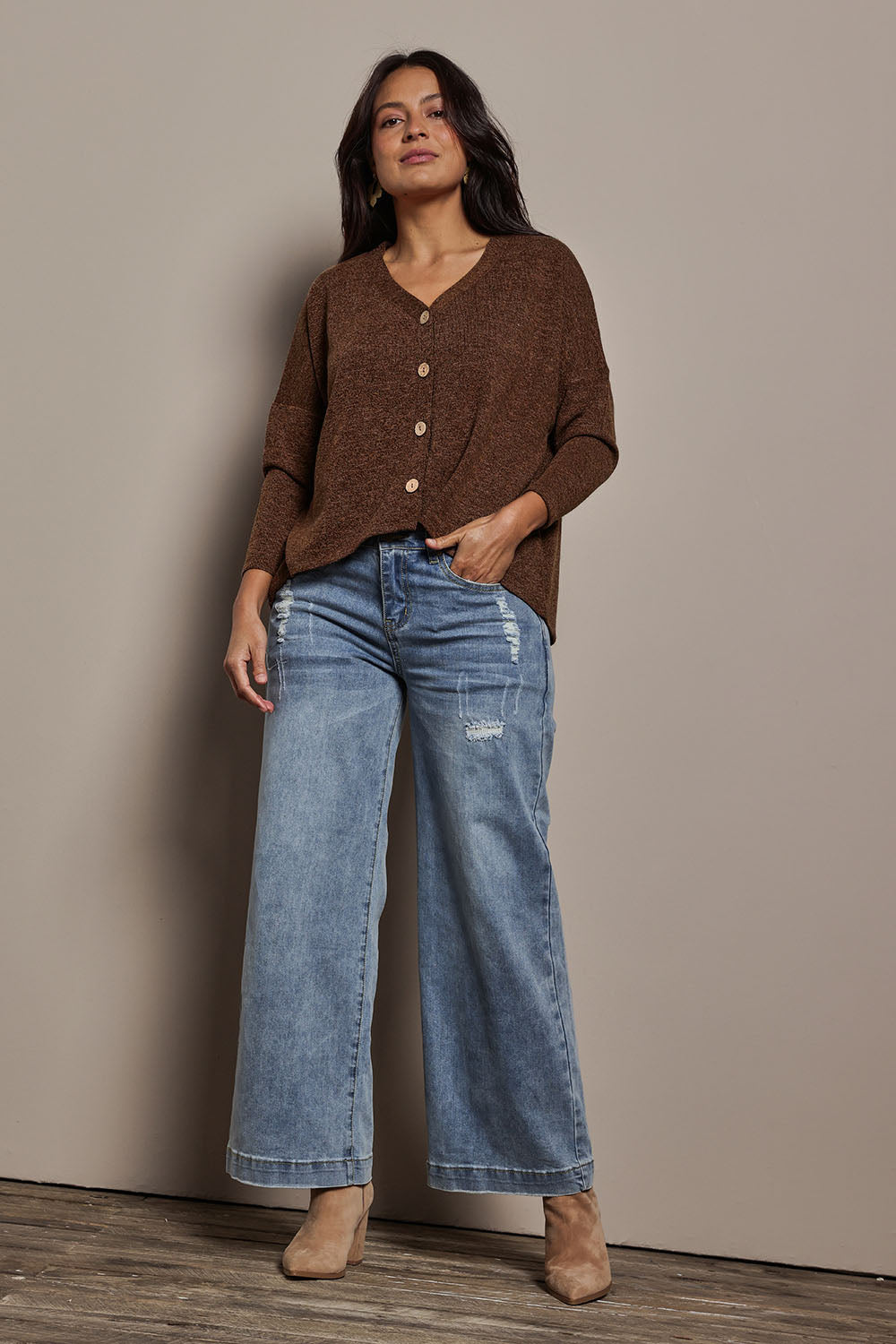Model Tahnee wearing size 10 of the My Boyfriends Slouch Cardi in colour Chocolate, from the front, showing the whole outfit