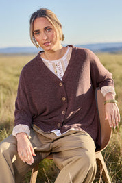 Model Tegan wearing size 10 of the My Boyfriends Slouch Cardi in colour Cocoa, from the front, showing the whole outfit