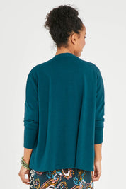 Model Noli wearing size 14 of the My Boyfriends Slouch Cardi in colour Deepteal (Blue), from the back