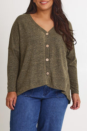 Model Ashleigh wearing size 16 of the My Boyfriends Slouch Cardi in colour Gum (Green), from the front, cropped image