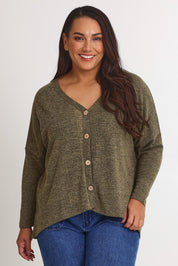 Model Ashleigh wearing size 16 of the My Boyfriends Slouch Cardi in colour Gum (Green), from the front, cropped image