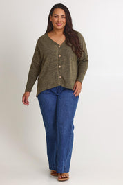 Model Ashleigh wearing size 16 of the My Boyfriends Slouch Cardi in colour Gum (Green), from the front, showing the whole outfit