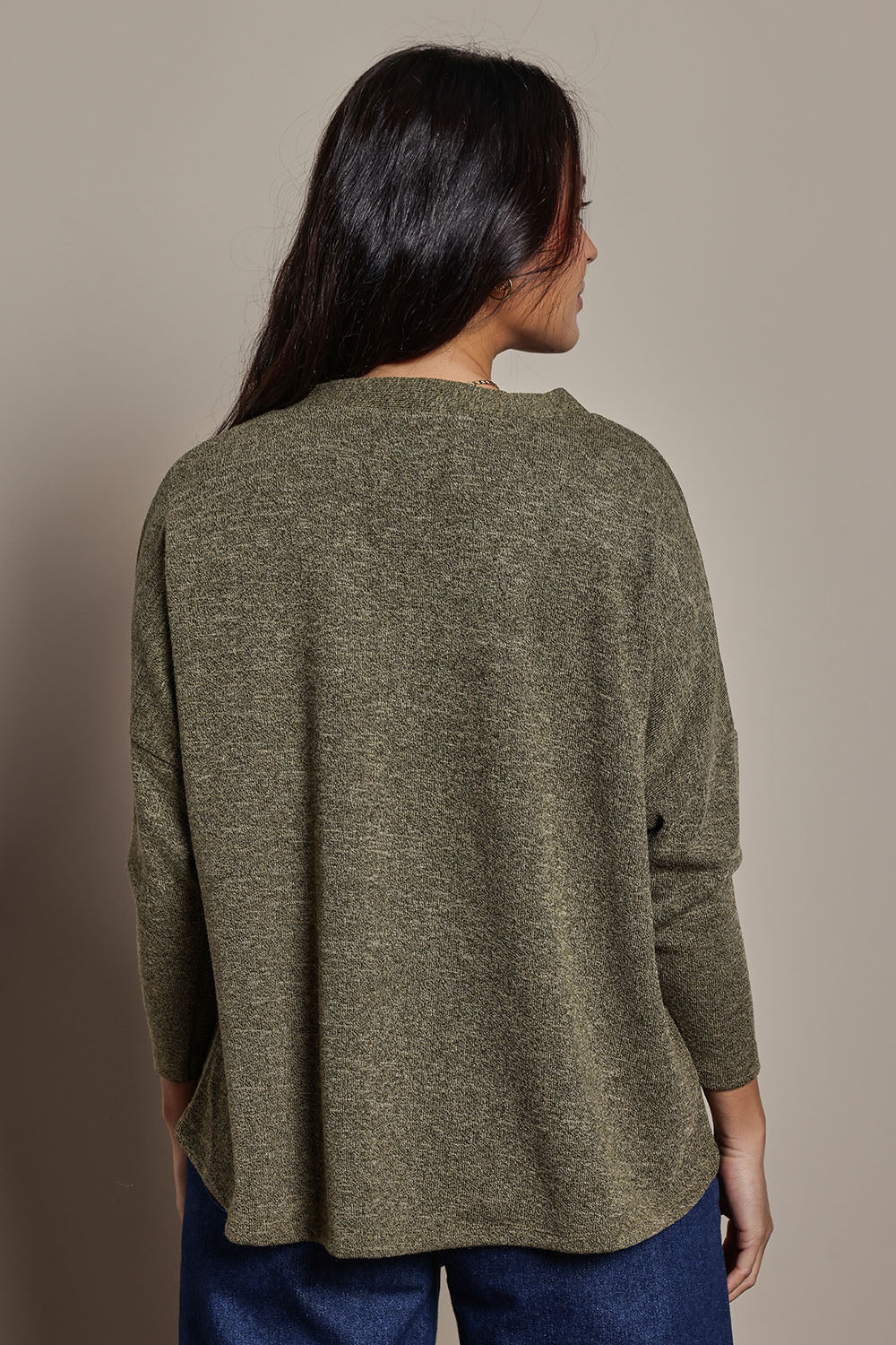 Model Tahnee wearing size 10 of the My Boyfriends Slouch Cardi in colour Gum (Green), from the back