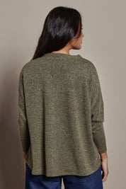 Model Tahnee wearing size 10 of the My Boyfriends Slouch Cardi in colour Gum (Green), from the back