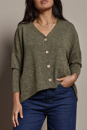 Model Tahnee wearing size 10 of the My Boyfriends Slouch Cardi in colour Gum (Green), from the front, cropped image