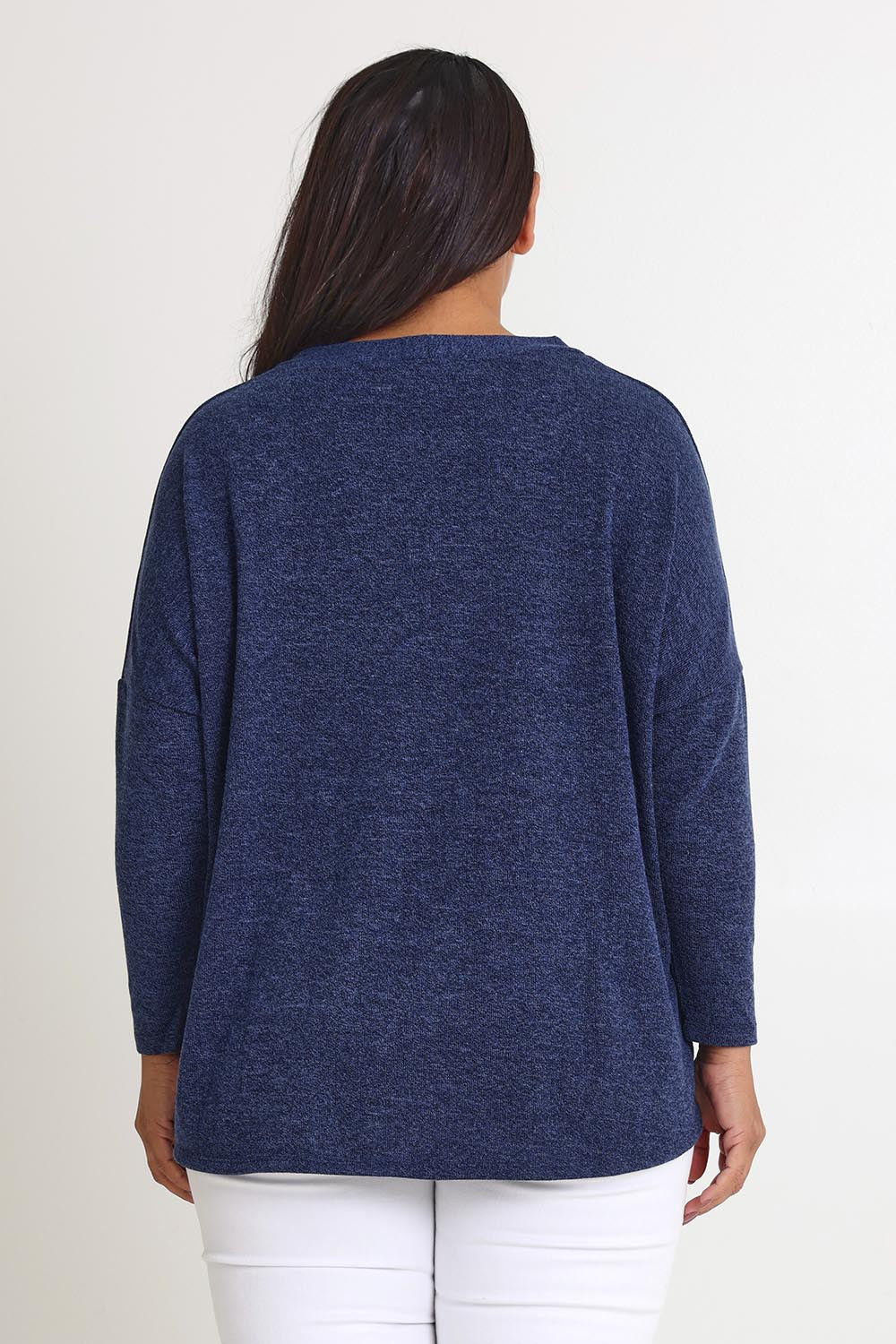 Model Ashleigh wearing size 16 of the My Boyfriends Slouch Cardi in colour Indigo (Blue), from the back