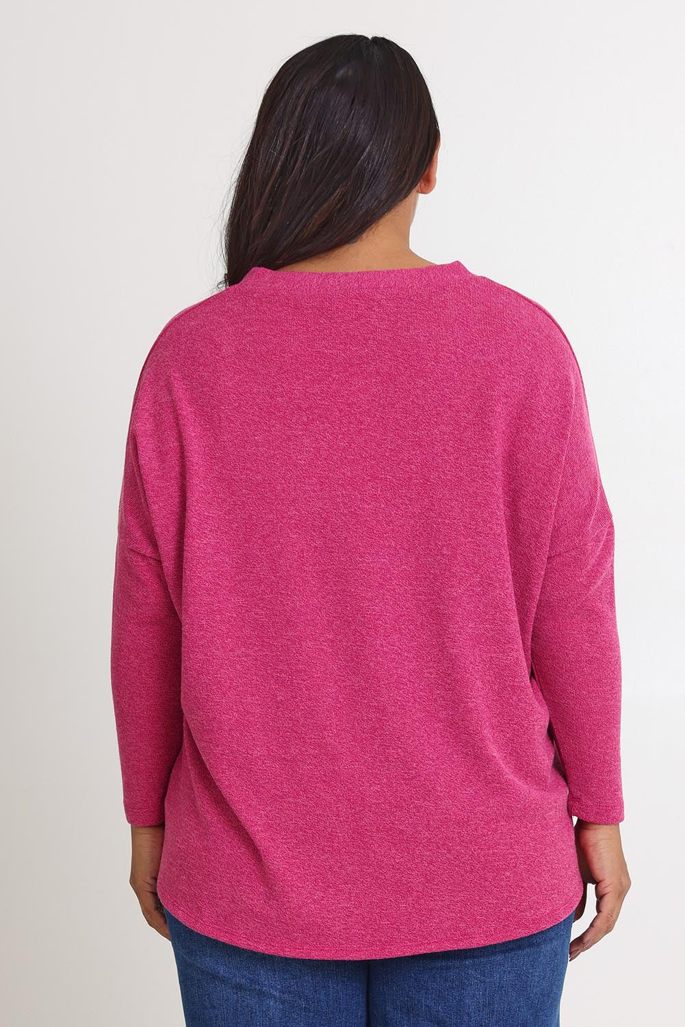 Model Ashleigh wearing size 16 of the My Boyfriends Slouch Cardi in colour Magenta (Pink), from the back