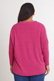 Model Ashleigh wearing size 16 of the My Boyfriends Slouch Cardi in colour Magenta (Pink), from the back