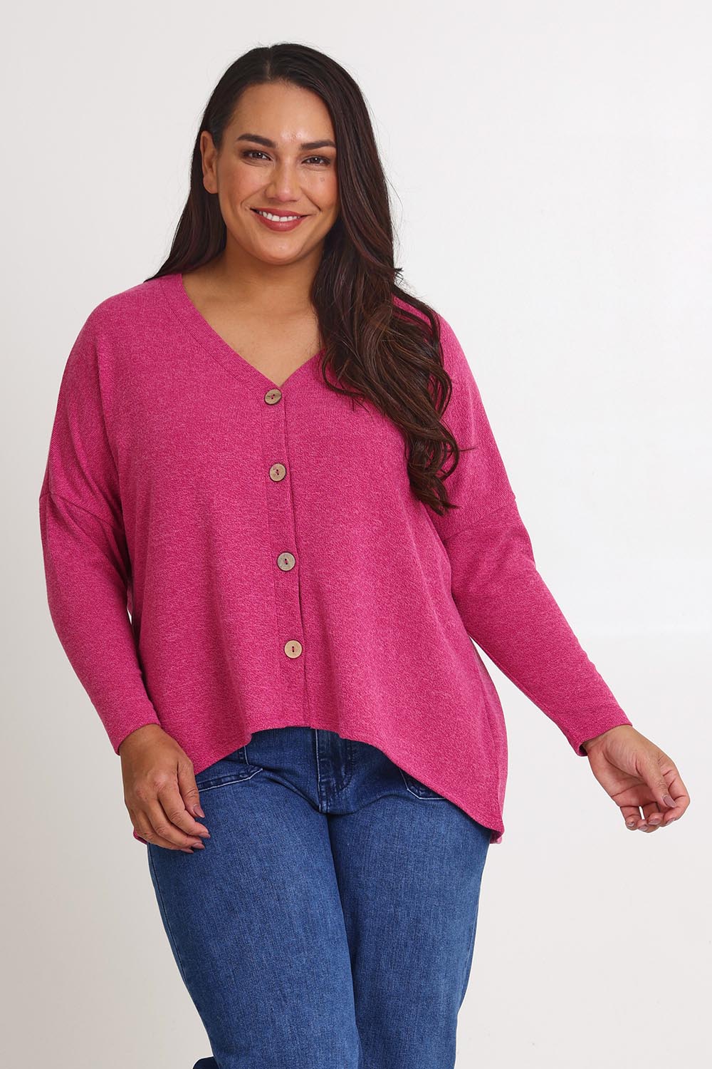 Model Ashleigh wearing size 16 of the My Boyfriends Slouch Cardi in colour Magenta (Pink), from the front, cropped image